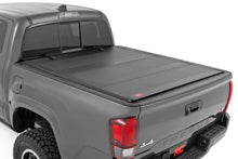 Load image into Gallery viewer, Hard Tri-Fold Flip Up Bed Cover | 6' Bed | Toyota Tacoma 2WD/4WD (2016-2023)