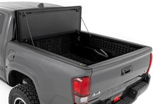 Load image into Gallery viewer, Hard Tri-Fold Flip Up Bed Cover | 6' Bed | Toyota Tacoma 2WD/4WD (2016-2023)
