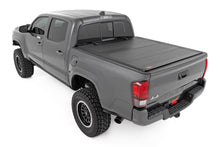 Load image into Gallery viewer, Hard Tri-Fold Flip Up Bed Cover | 6' Bed | Toyota Tacoma 2WD/4WD (2016-2023)