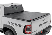 Load image into Gallery viewer, Hard Tri-Fold Flip Up Bed Cover | 6'4" | Ram 1500 (19-25)/1500 TRX (21-24)
