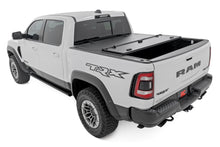 Load image into Gallery viewer, Hard Tri-Fold Flip Up Bed Cover | 6'4" | Ram 1500 (19-25)/1500 TRX (21-24)