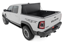 Load image into Gallery viewer, Hard Tri-Fold Flip Up Bed Cover | 6'4" | Ram 1500 (19-25)/1500 TRX (21-24)