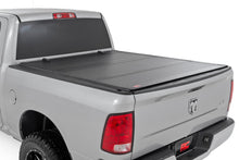 Load image into Gallery viewer, Hard Tri-Fold Flip Up Bed Cover | 5'7" Bed | Ram 1500 2WD/4WD (2009-2018 &amp; Classic)
