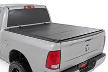Load image into Gallery viewer, Hard Tri-Fold Flip Up Bed Cover | 6'4" Bed | Ram 1500 (09-18)/2500 (10-24) 