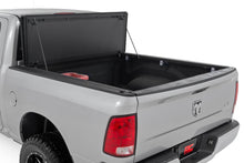Load image into Gallery viewer, Hard Tri-Fold Flip Up Bed Cover | 5'7" Bed | Ram 1500 2WD/4WD (2009-2018 &amp; Classic)