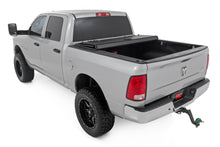 Load image into Gallery viewer, Hard Tri-Fold Flip Up Bed Cover | 5'7" Bed | Ram 1500 2WD/4WD (2009-2018 &amp; Classic)