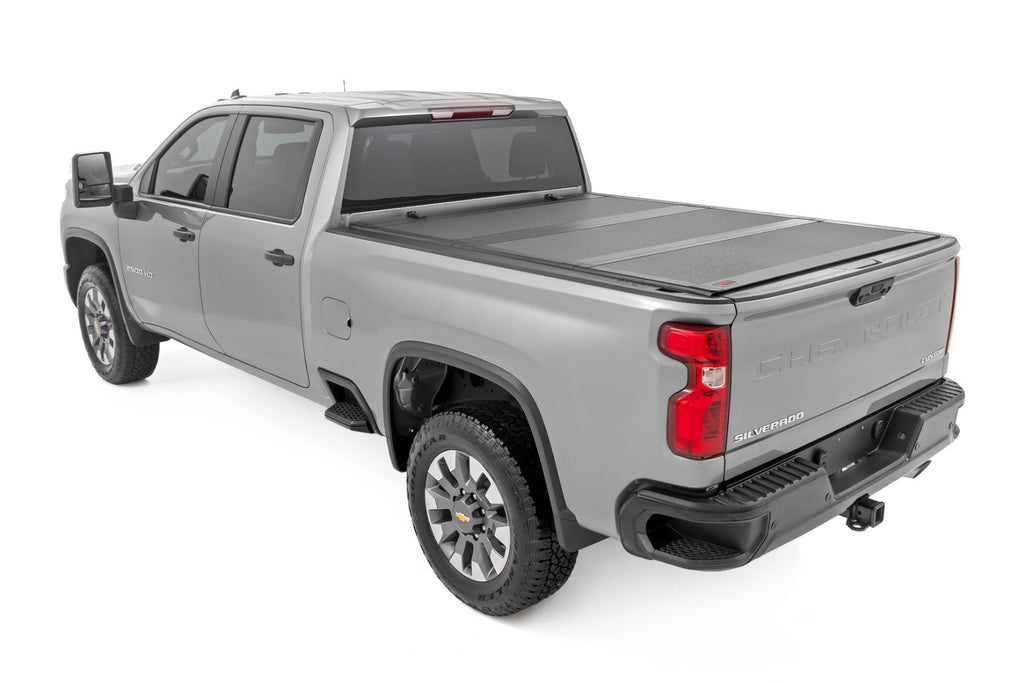 Hard Tri-Fold Flip Up Bed Cover | 6'9" Bed | Chevy/GMC  Silverado/Sierra 2500HD/3500HD (20-24)