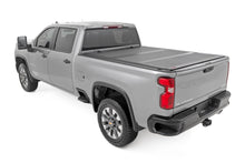 Load image into Gallery viewer, Hard Tri-Fold Flip Up Bed Cover | 6'9" Bed | Chevy/GMC  Silverado/Sierra 2500HD/3500HD (20-24)