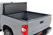 Load image into Gallery viewer, Hard Tri-Fold Flip Up Bed Cover | 5'7" Bed | Toyota Tundra 2WD/4WD (07-21)