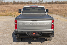 Load image into Gallery viewer, Hard Tri-Fold Flip Up Bed Cover | 6'9" Bed | Chevy/GMC  Silverado/Sierra 2500HD/3500HD (20-24)